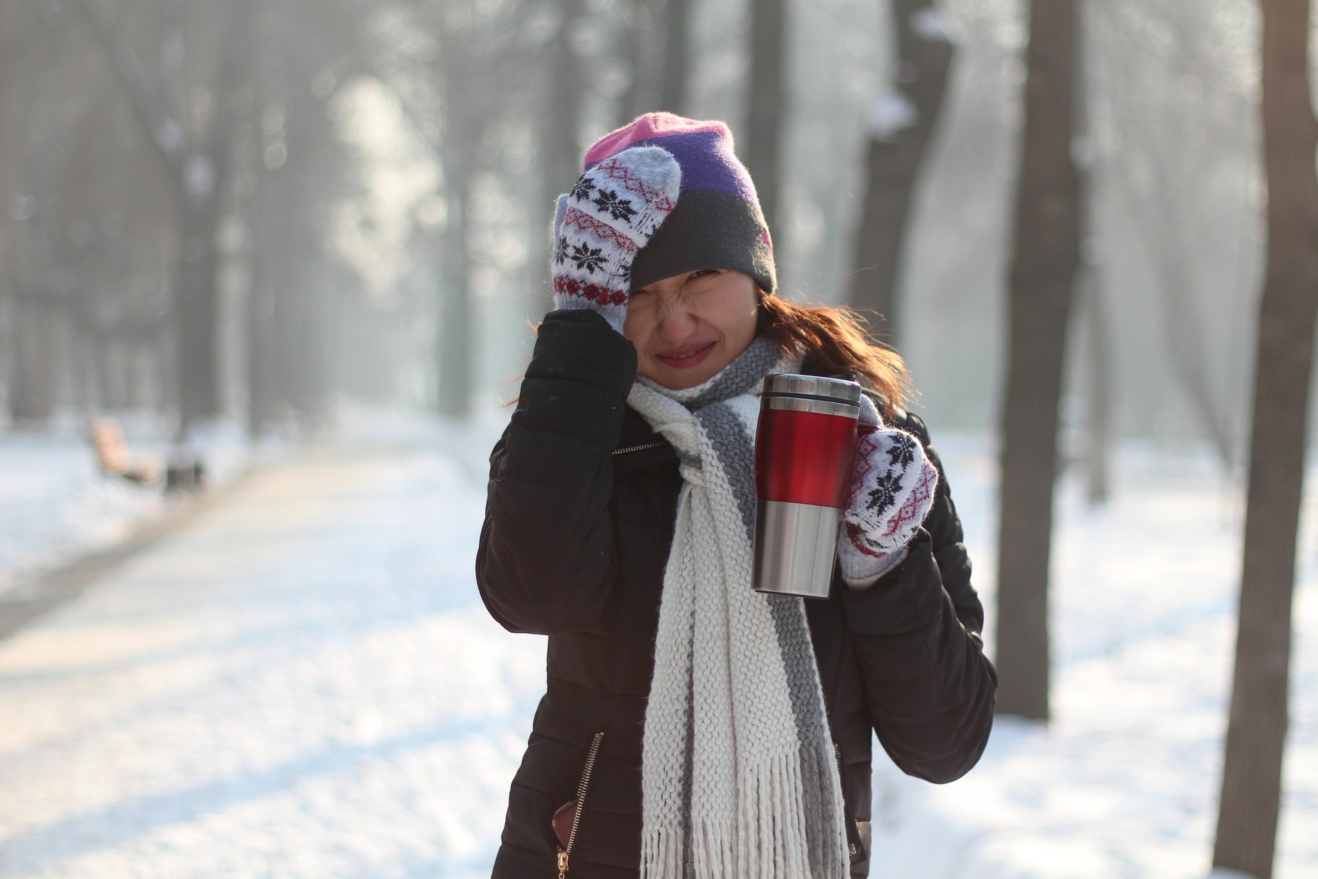 woman scratching her head looking apologetic